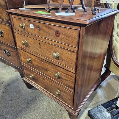 Lot 192 - A 19th century mahogany cammode faux drawer front
