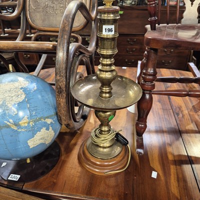 Lot 196 - A brass table lamp in the eastern manner