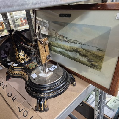 Lot 226 - A vintage sewing machine and a lenr print