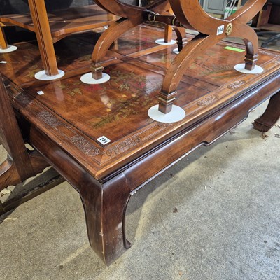 Lot 243 - A large oriental style coffee table