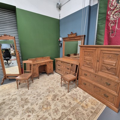 Lot 255 - An American Victorian carved and inlaid maple...