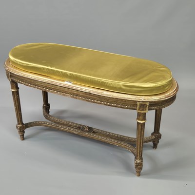 Lot 340 - An antique French carved giltwood window seat,...