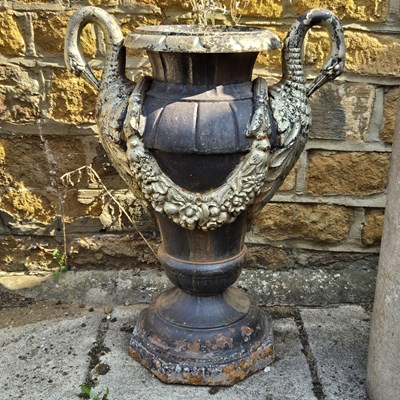 Lot 305 - A cast iron classical style urn, with gilt...