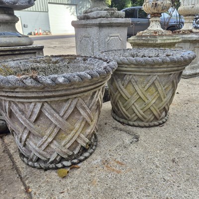 Lot 391 - A pair of Haddonstone weathered composite...