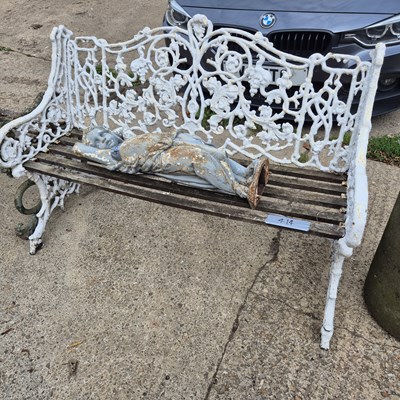 Lot 414 - An antique painted cast iron garden bench,...