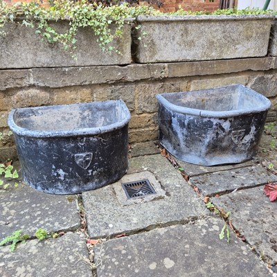 Lot 402 - A pair of antique D form lead planters. H 33 W...