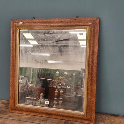 Lot 386 - A Victorian maple mirror. H 81 W 73cms