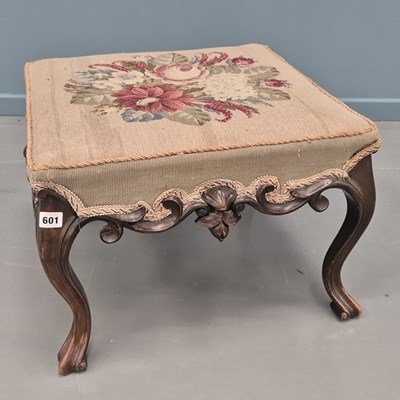 Lot 601 - A Victorian large foot stool on carved...