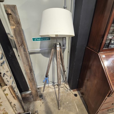 Lot 297 - A tripod standard lamp