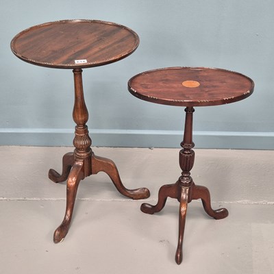 Lot 618 - An Edwardian tripod wine table with oval...