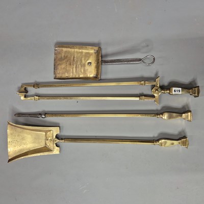 Lot 619 - A set of late 19th century brass fireside...
