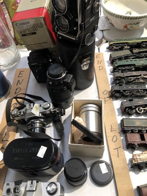 Lot 344 - A Mamiya model C330 professional twin lens...