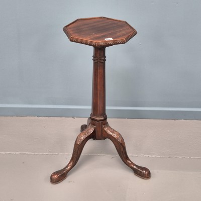 Lot 621 - An antique mahogany kettle stand with...