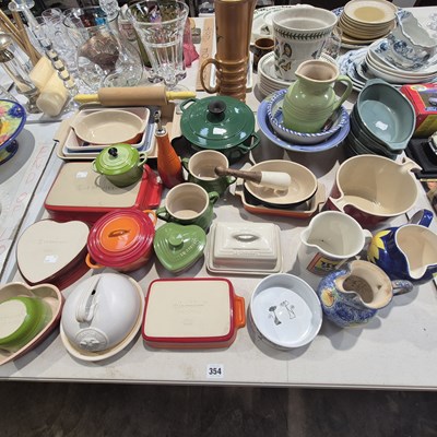 Lot 354 - A quantity of La Creuset pottery and cast iron...