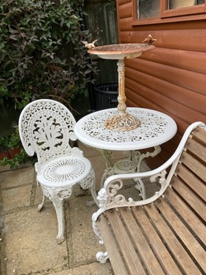 Lot 402 - A Vintage garden bench , a cast patio table, a...