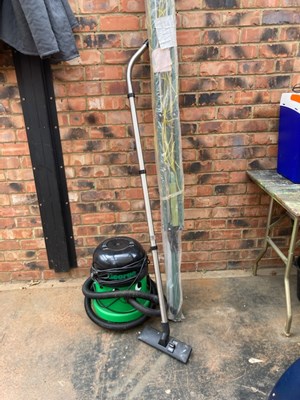Lot 412 - A Henry vacuum cleaner and a Hozelock rotary...