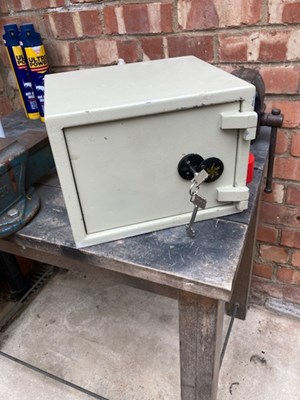 Lot 413 - A floor safe with keys