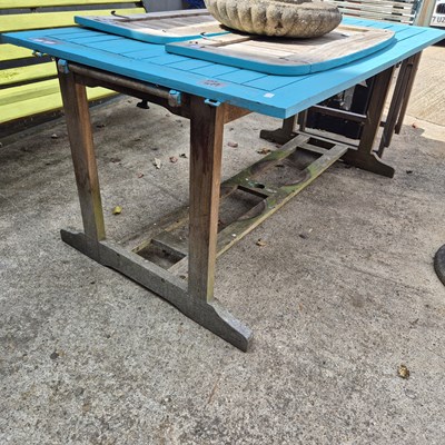 Lot 419 - A painted teak garden table