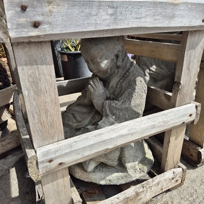 Lot 424 - An eastern Buddha figure
