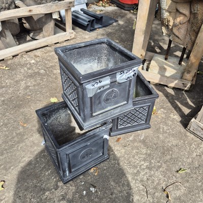 Lot 436 - A set of three small square terrace planters
