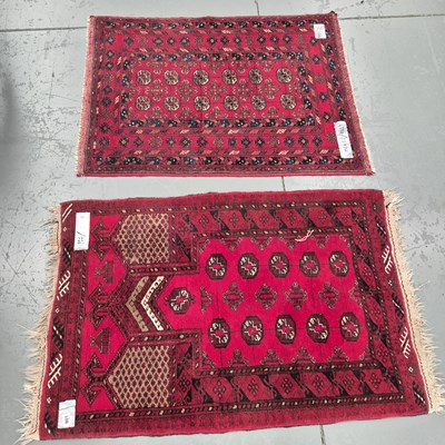 Lot 901 - Two Oriental small rugs, an Afghan prayer rug,...