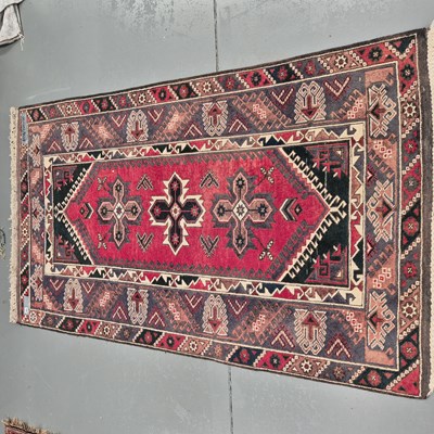 Lot 905 - A Turkish tribal rug, 220 x 130cms