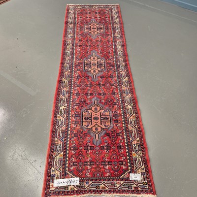 Lot 911 - A Persian Hamadan runner, 274 x 83cms