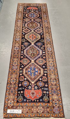 Lot 913 - A Persian runner of Caucasian design, 314 x 84cms