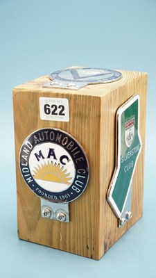 Lot 622 - Five wood block mounted car badges for Bentley,...