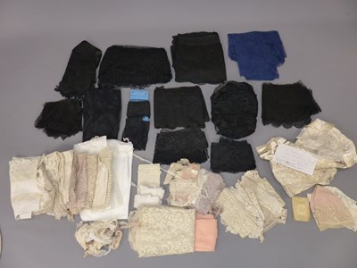 Lot 1332 - A collection of lace, to include a black shawl,...
