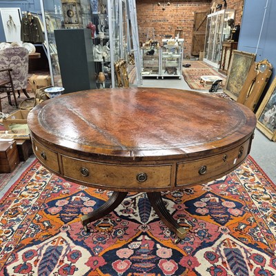 Lot 642 - A late Georgian mahogany drum table on...