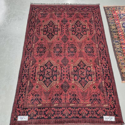 Lot 1742 - Two Oriental tribal rugs, 199 x 129, 146 x...