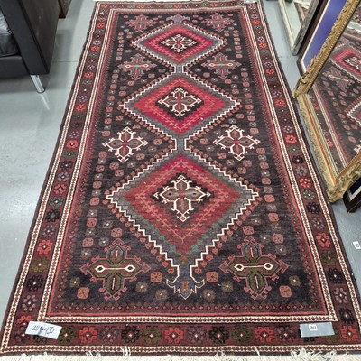 Lot 1743 - A Persian Hamadan rug, 284 x 131cms