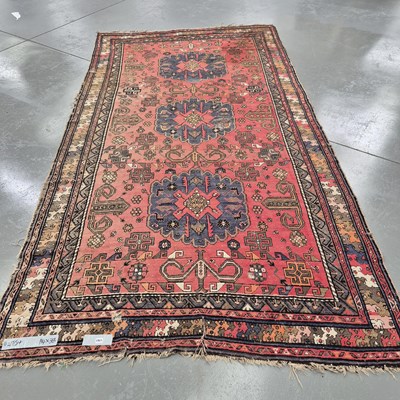 Lot 1763 - An unusual large antique Caucasian rug, 363 x...