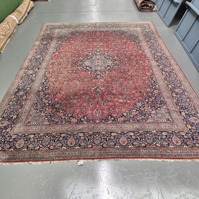 Lot 1765 - An antique Persian Keshan carpet, 366 x 266cms