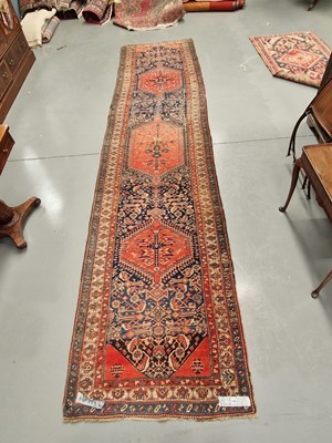 Lot 1768 - A good antique Persian tribal runner, 493 x...