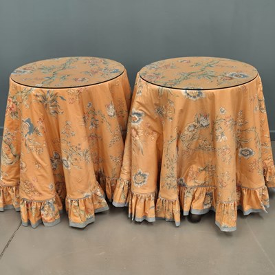 Lot 646 - A pair of bedside tables with draped fabric...