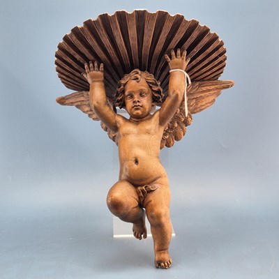 Lot 406 - An antique Italian carved wall bracket with...