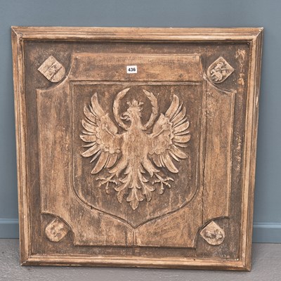 Lot 436 - A carved oak heraldic panel, shield form...