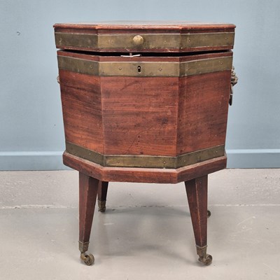 Lot 447 - A late Georgian mahogany brass bound...