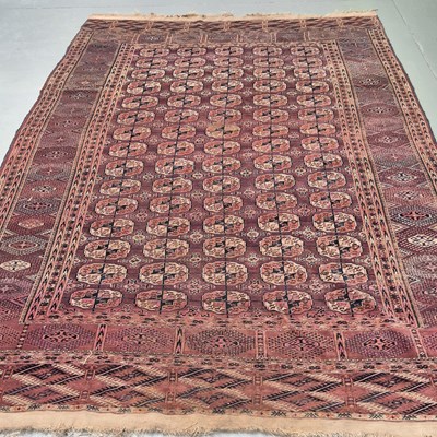 Lot 588 - An antique Tekke Bokhara main carpet, 408 x...
