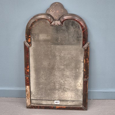 Lot 467 - An early tortoiseshell mirror with white metal...