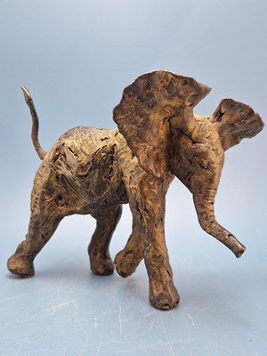 Lot 1346 - A contemporary bronze sculpture of a running...