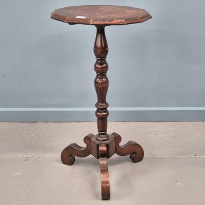 Lot 681 - An antique and later walnut candle table in a...