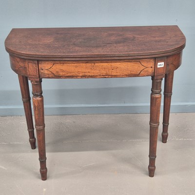 Lot 682 - A George IV mahogany and ebony strung fold...
