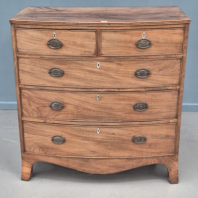 Lot 689 - A late Georgian mahogany bow-front chest of...