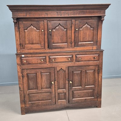 Lot 1784 - An 18th century oak duodarn, court cupboard...
