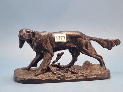Lot 1377 - A Russian iron figure of a retreiver standing...