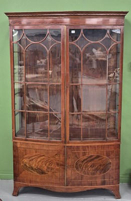 Lot 698 - A 19th-century mahogany and inlaid bow-front...