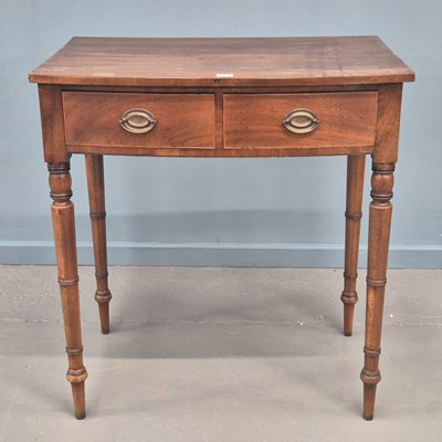 Lot 700 - A regency mahogany small side table with two...